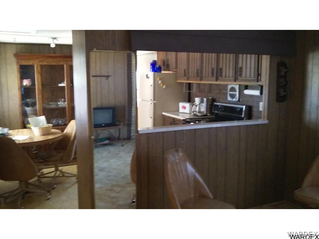 3681 Bosque Road Golden Valley, AZ 86413 - Photo 10 of 17 a kitchen view with table and chairs