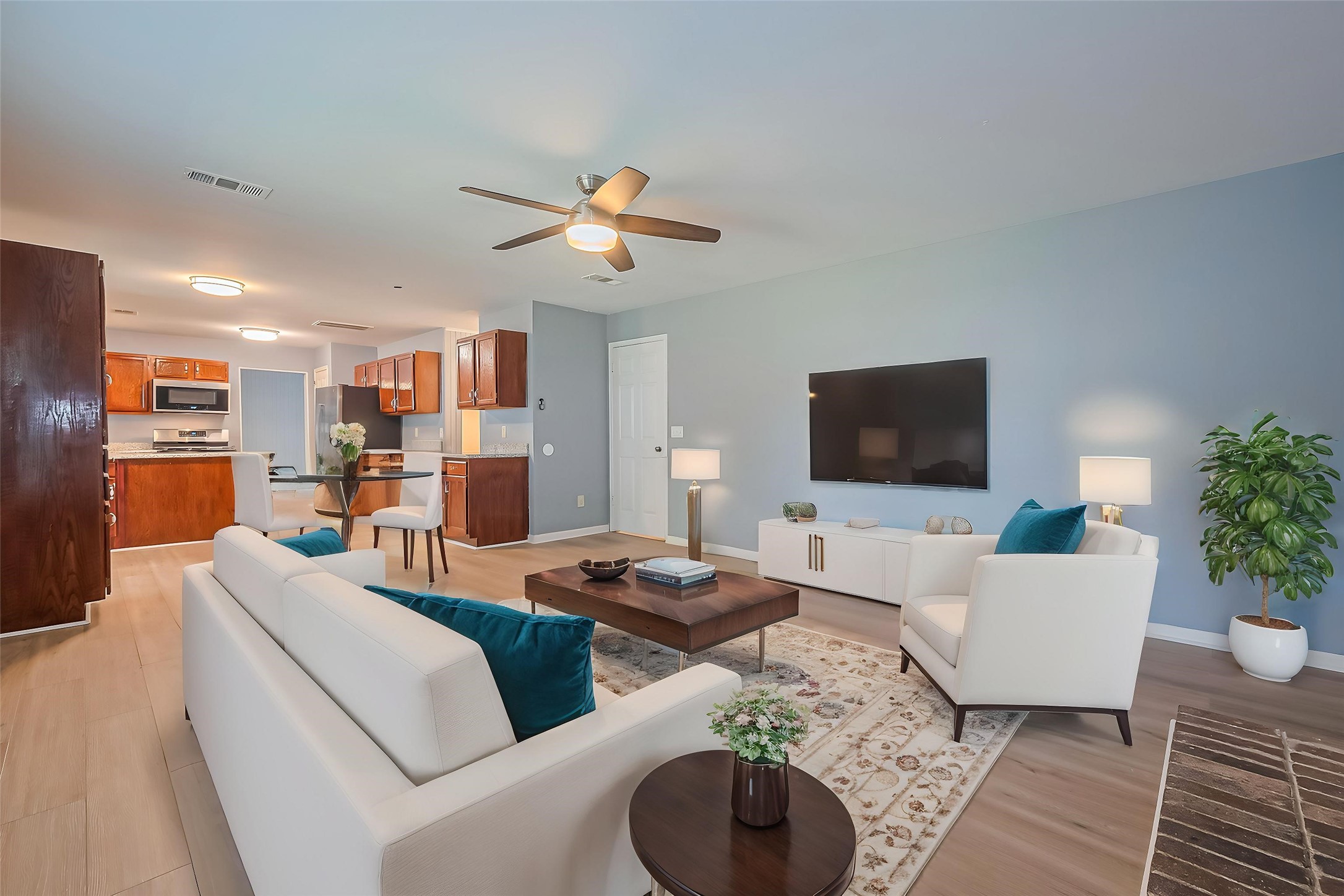 1010 Cheyenne Meadows Drive Katy, TX 77450 - Photo 15 of 41 a living room with furniture and a flat screen tv