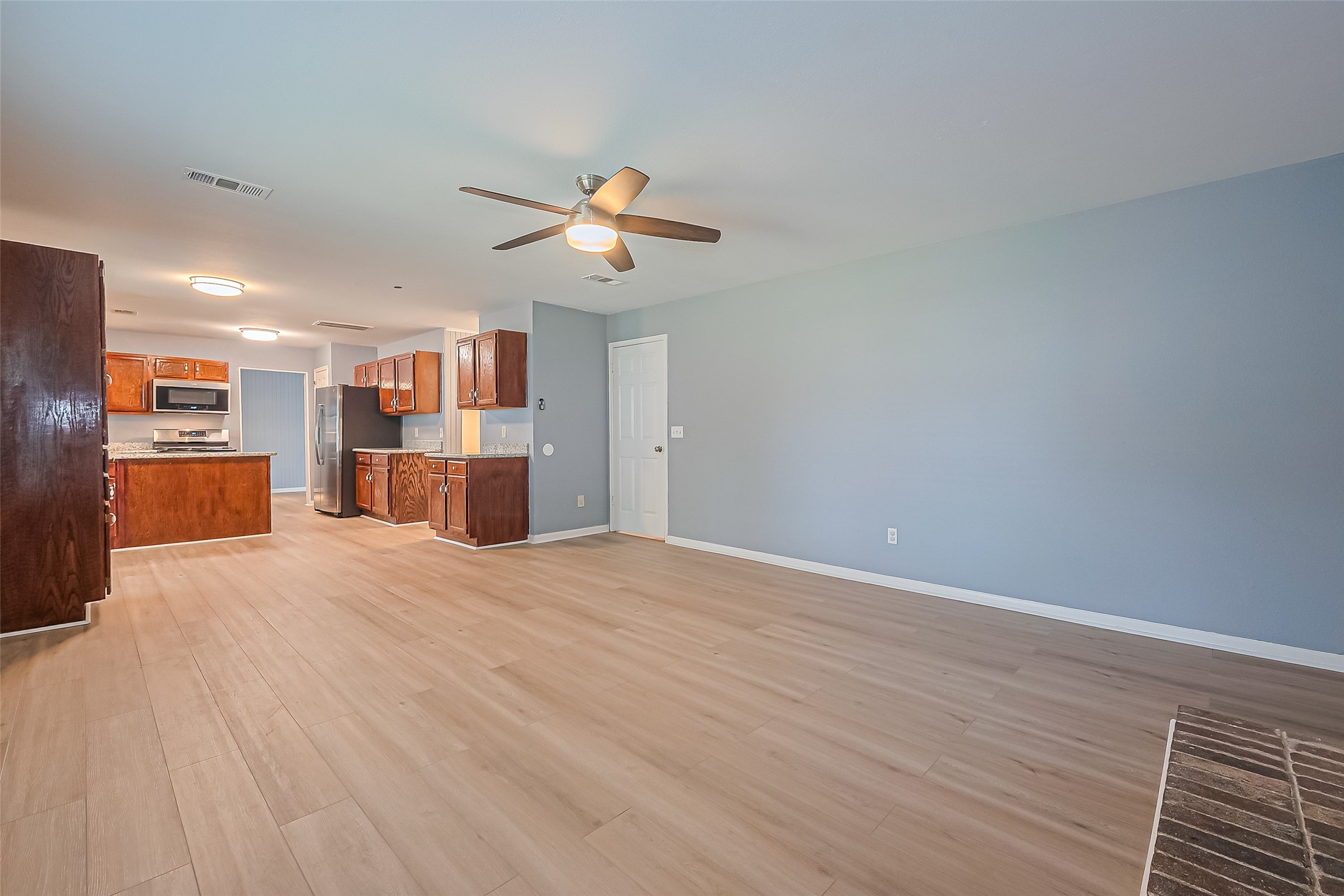 1010 Cheyenne Meadows Drive Katy, TX 77450 - Photo 16 of 41 a view of a kitchen with a dishwasher and cabinets