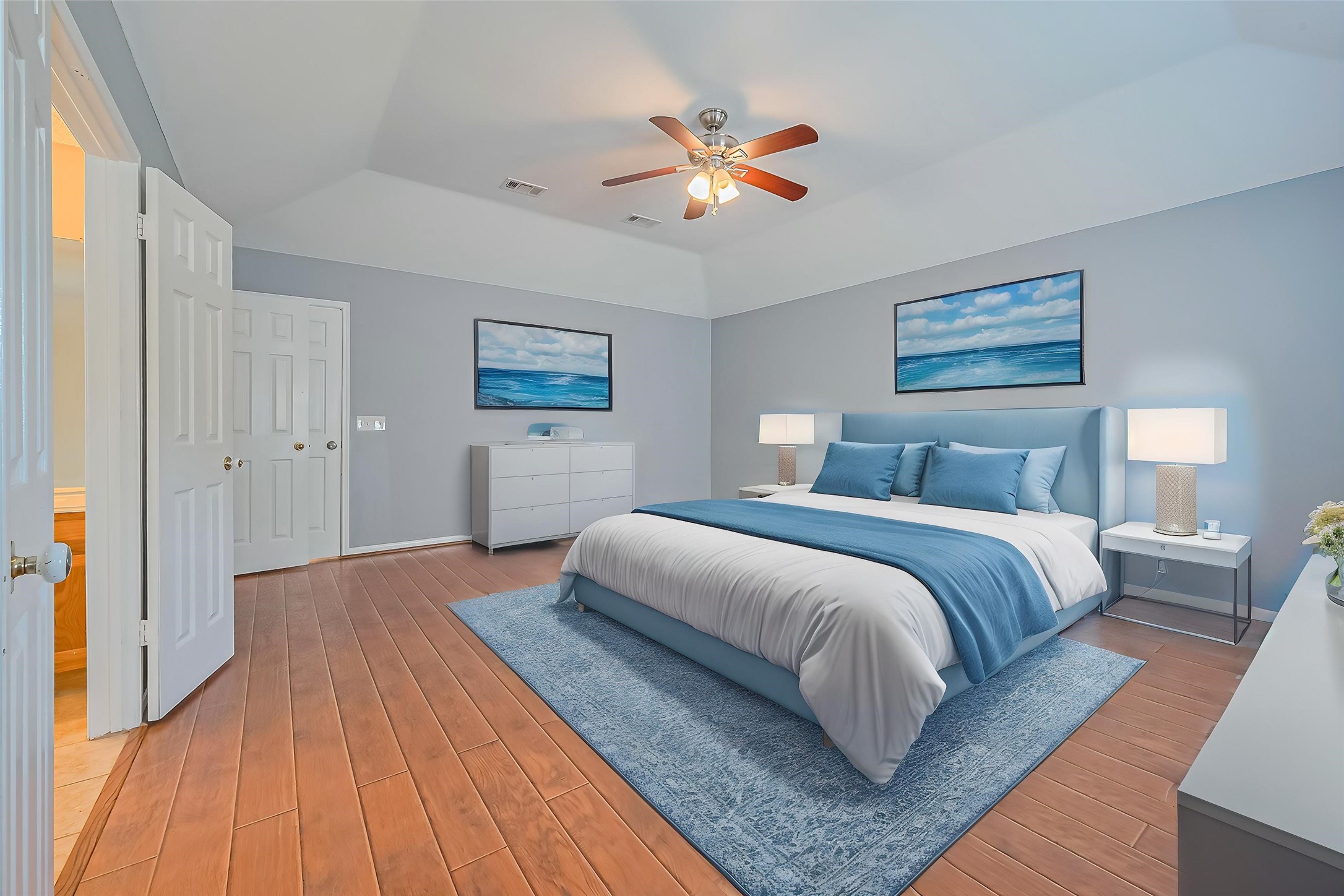 1010 Cheyenne Meadows Drive Katy, TX 77450 - Photo 26 of 41 a bedroom with a large bed and a chandelier