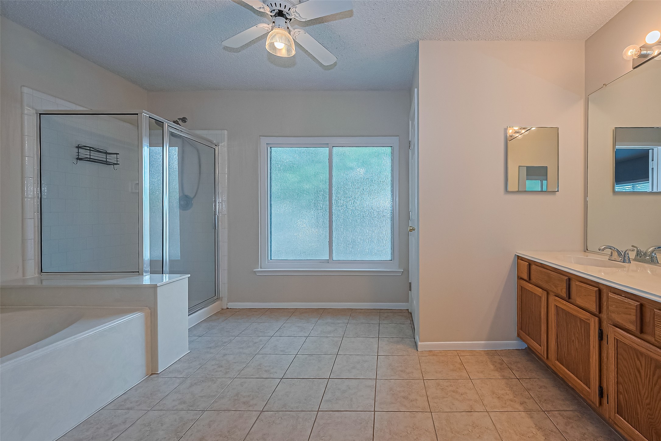 1010 Cheyenne Meadows Drive Katy, TX 77450 - Photo 29 of 41 a bathroom with a tub shower and sink