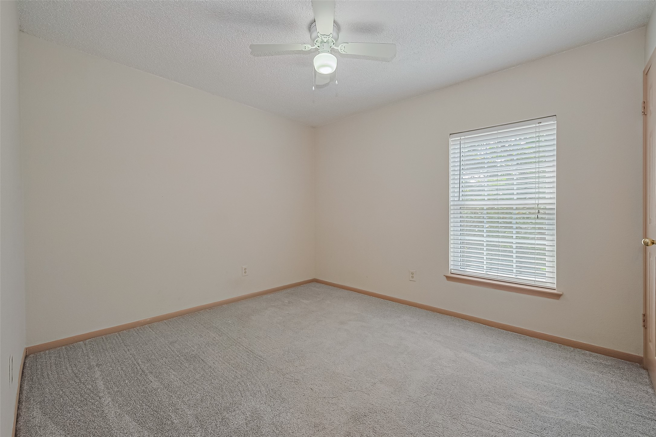 1010 Cheyenne Meadows Drive Katy, TX 77450 - Photo 32 of 41 an empty room with a window