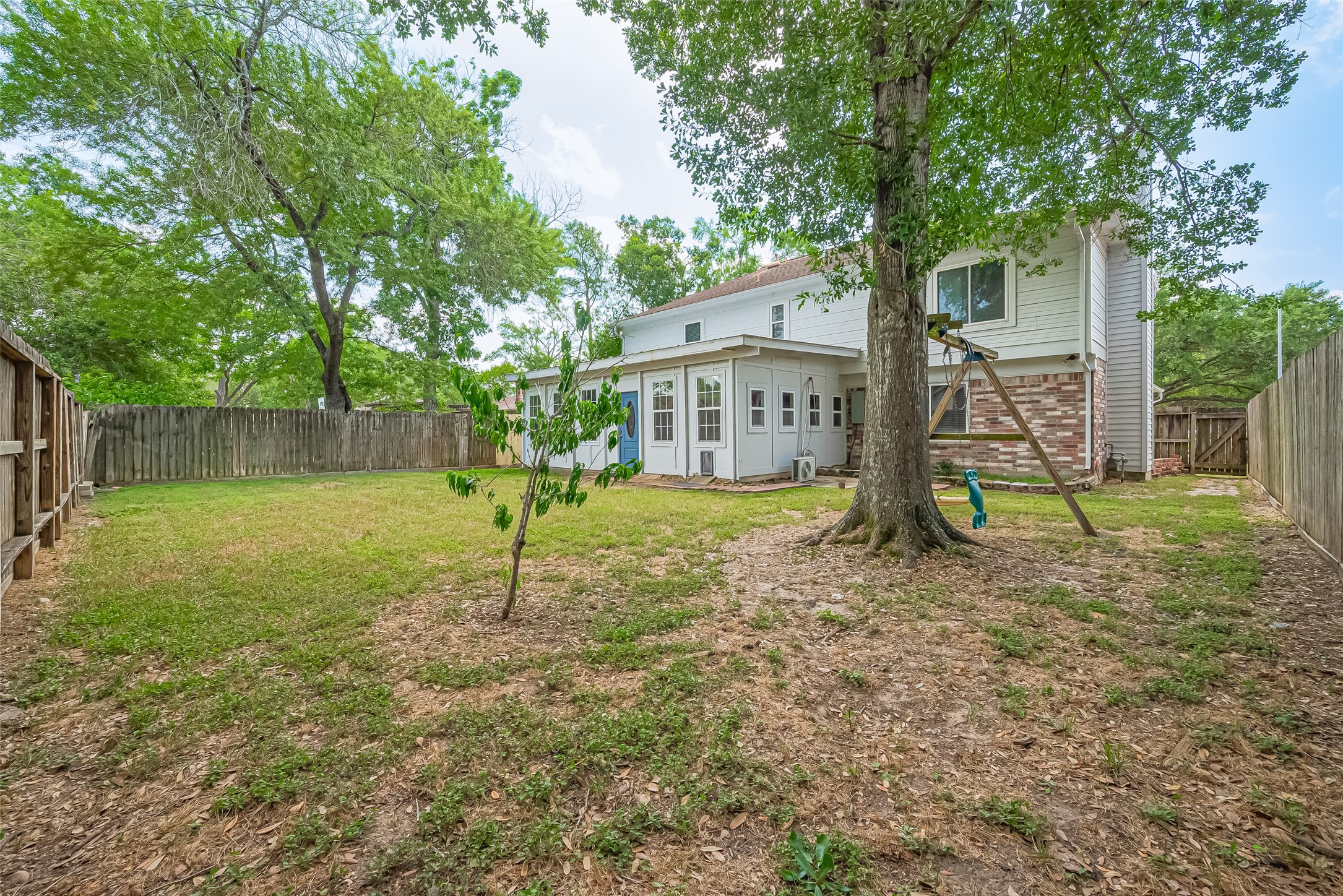 1010 Cheyenne Meadows Drive Katy, TX 77450 - Photo 39 of 41 a house with trees in the background
