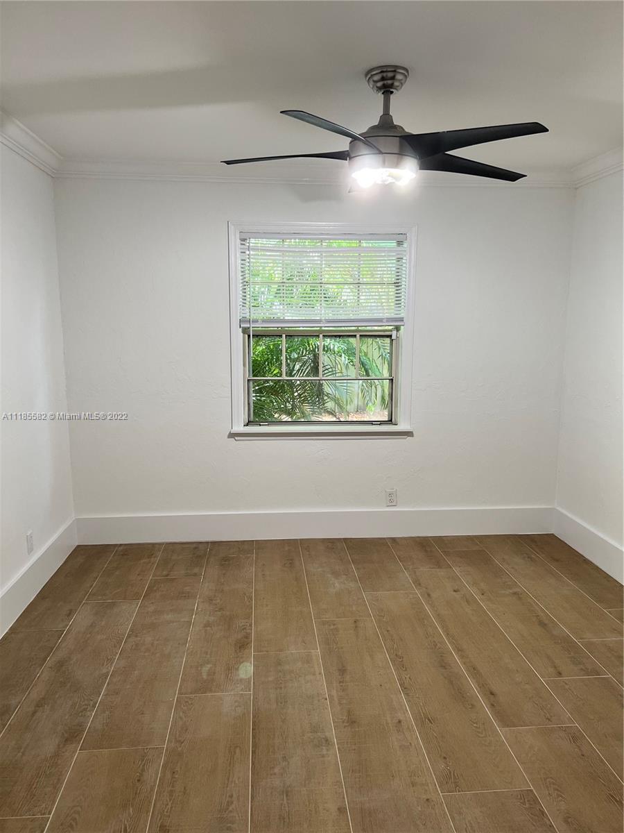 11156 Goss Lane Boca Raton, FL 33428 - Photo 17 of 20 a view of an empty room with a window