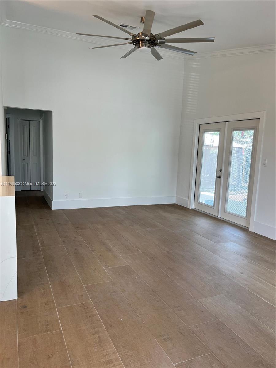 11156 Goss Lane Boca Raton, FL 33428 - Photo 19 of 20 an empty room with a empty space and windows