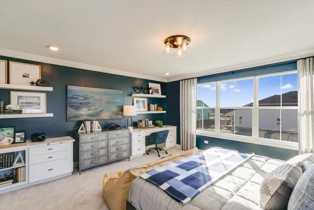 a bed room with furniture and a large window