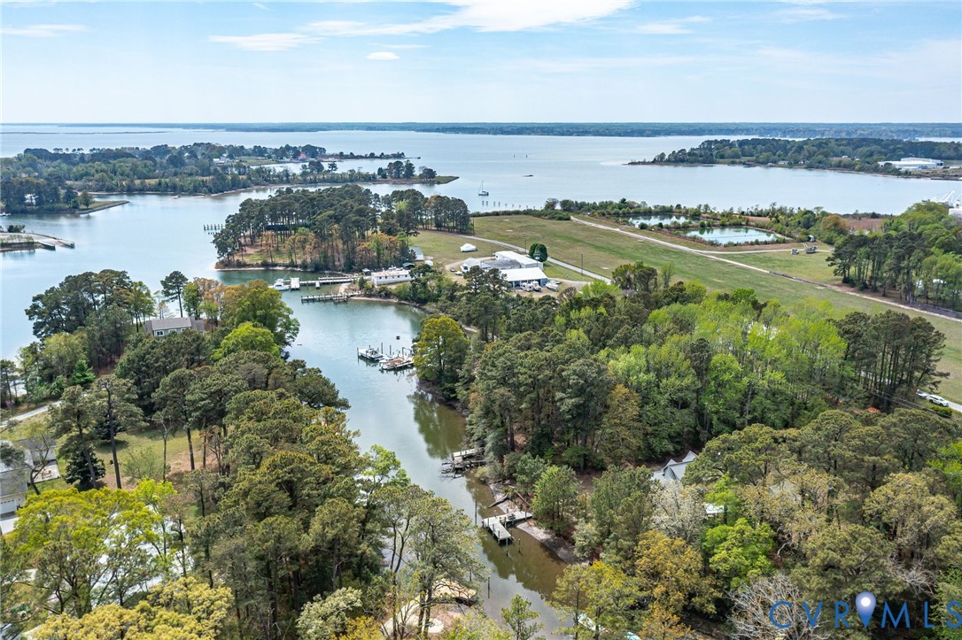 193 Deep Water Lane Reedville, VA 22539 - Photo 43 of 84 a view of a lake with a city