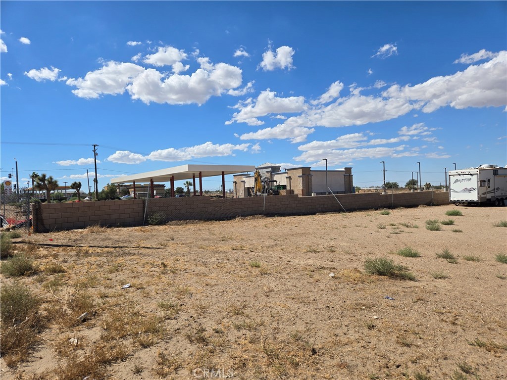 9760 Phelan Road Oak Hills, CA 92344 - Photo 7 of 8 a view of pool and snow on the beach