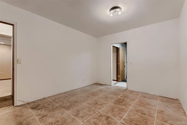 a view of a livingroom with a staircase