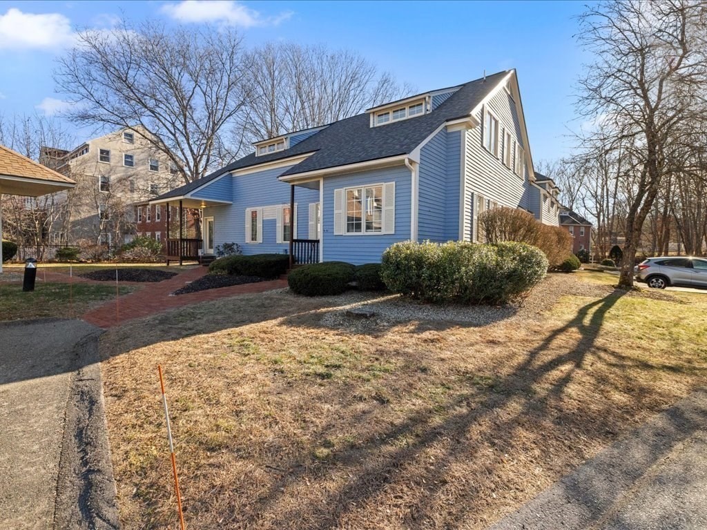 a brick house with a yard