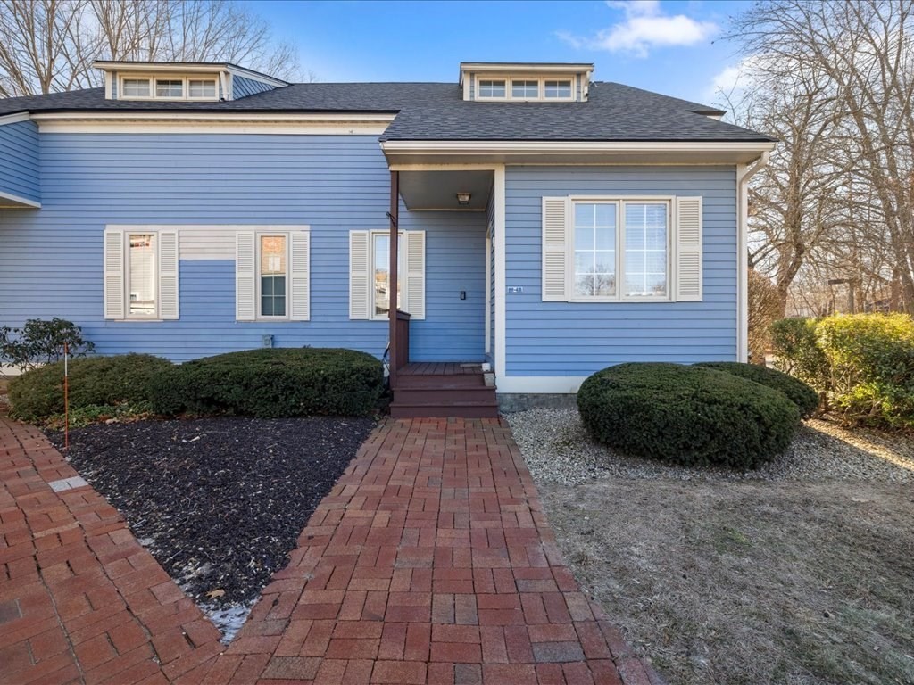 4 Strathmore Shire Drive, Unit B Uxbridge, MA 01569 - Photo 3 of 41 a front view of a house