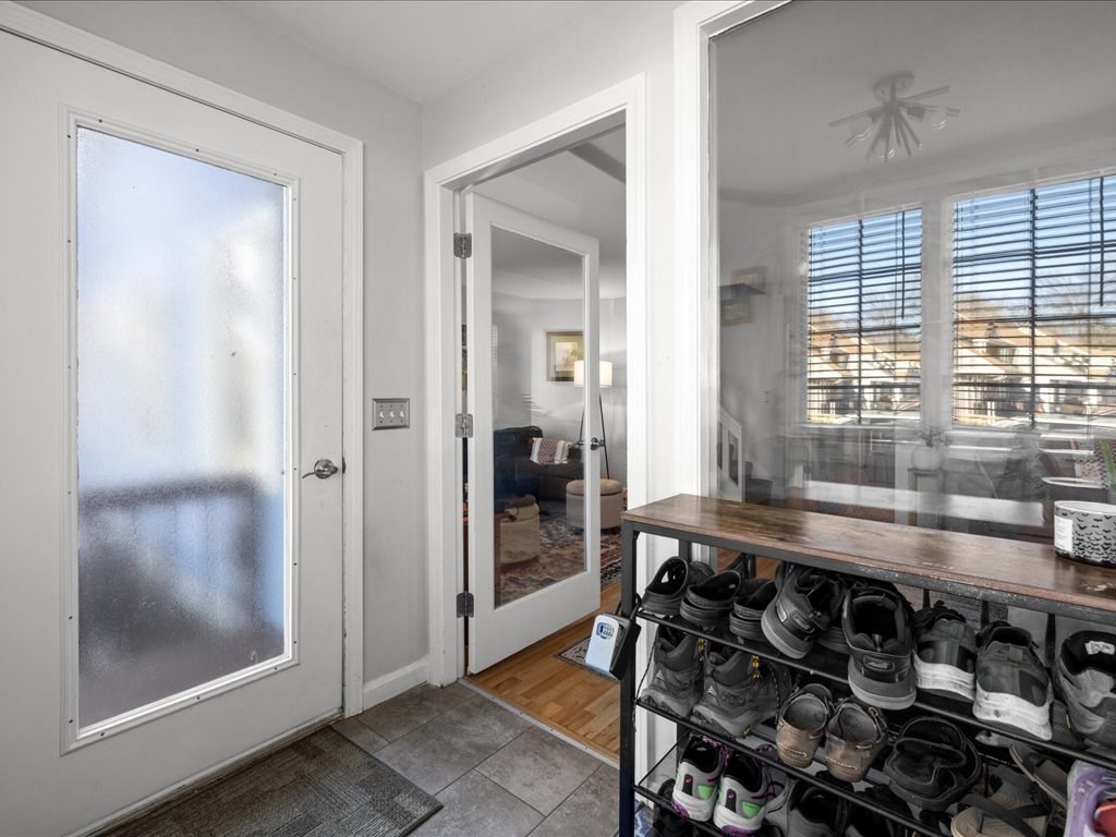 4 Strathmore Shire Drive, Unit B Uxbridge, MA 01569 - Photo 6 of 41 a room with wooden floor and furniture