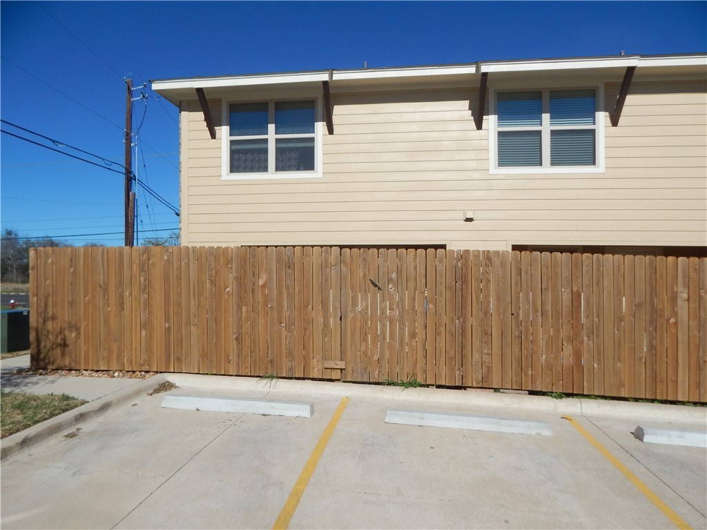 3500 South College Avenue, Unit 204 Bryan, TX 77801 - Photo 6 of 7 a view of a wooden door