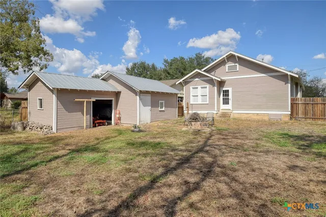 a view of house with the outdoor space