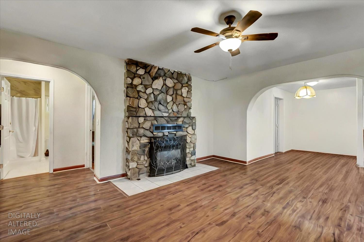 11312 Alpine Lane Grass Valley, CA 95945 - Photo 12 of 69 wooden floor in an empty room with a ceiling fan