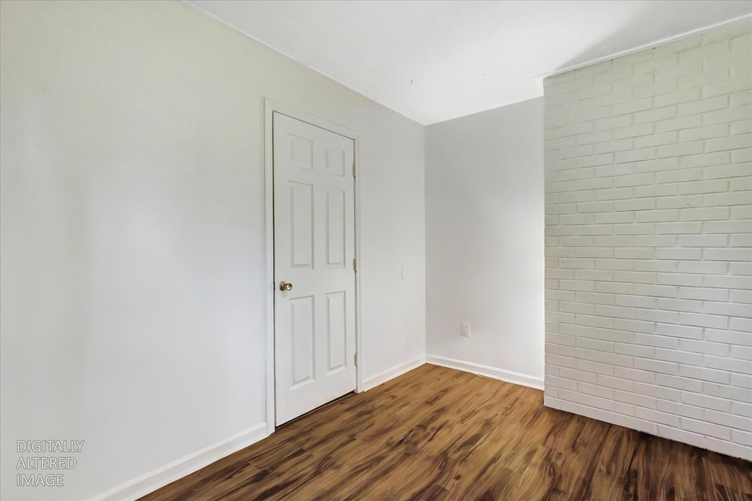 11312 Alpine Lane Grass Valley, CA 95945 - Photo 23 of 69 a view of an empty room with wooden floor