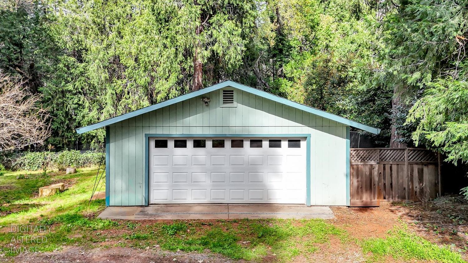 11312 Alpine Lane Grass Valley, CA 95945 - Photo 35 of 69 a front view of house with yard and trees in the background