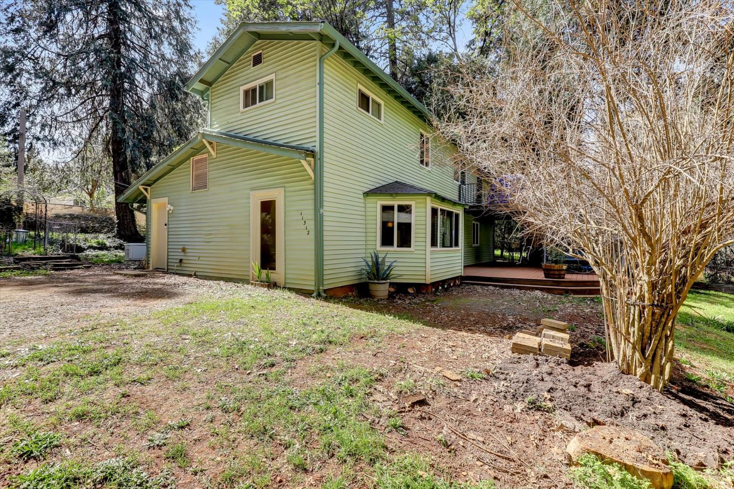11312 Alpine Lane Grass Valley, CA 95945 - Photo 44 of 69 a front view of a house with a yard