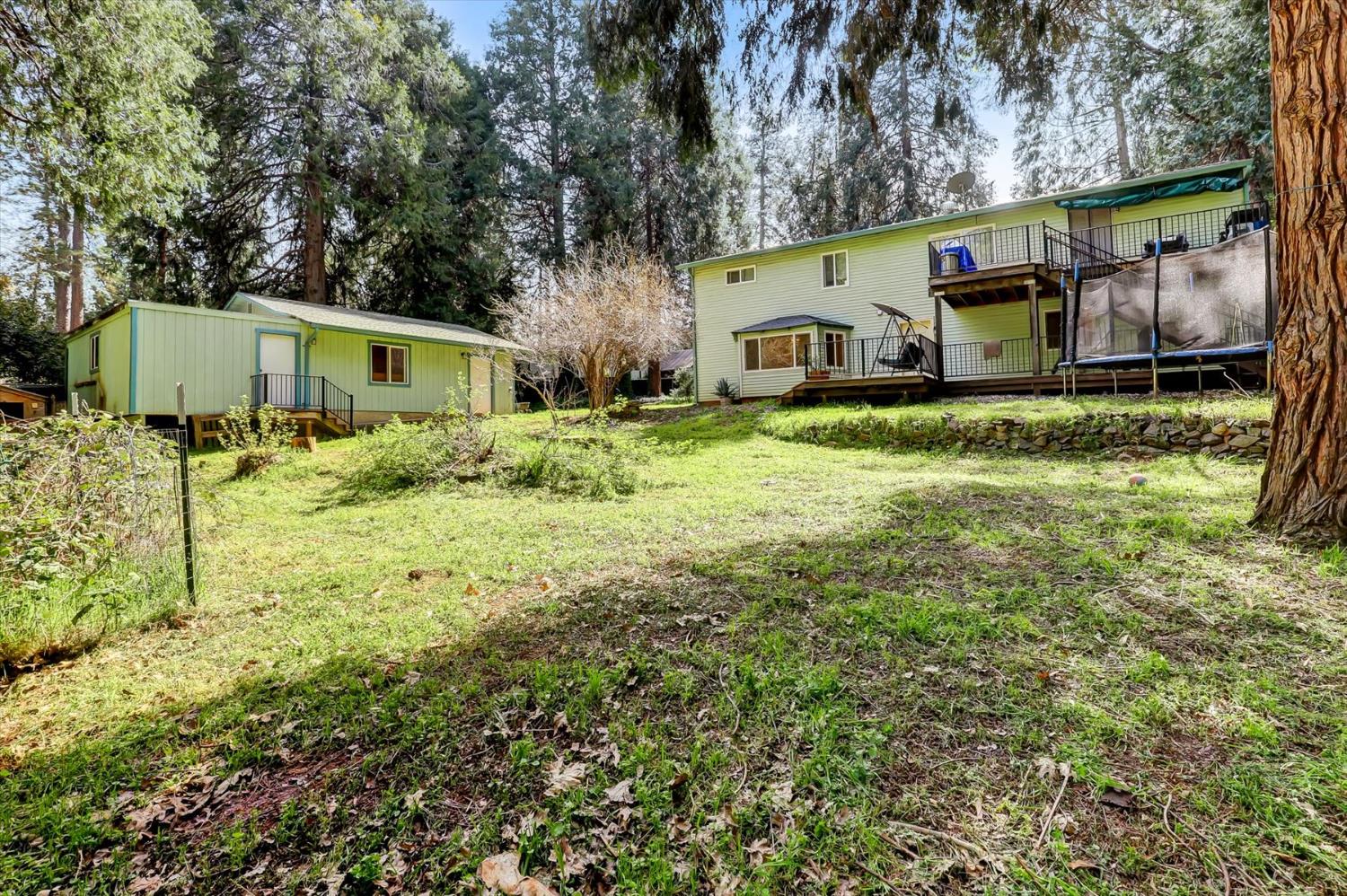 11312 Alpine Lane Grass Valley, CA 95945 - Photo 46 of 69 a front view of a house with garden