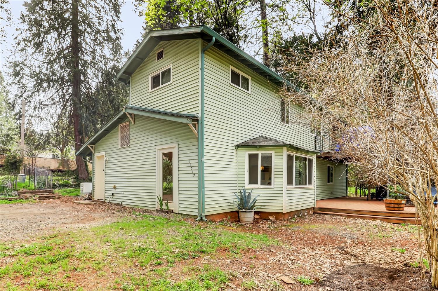 11312 Alpine Lane Grass Valley, CA 95945 - Photo 5 of 69 a view of a house with a yard