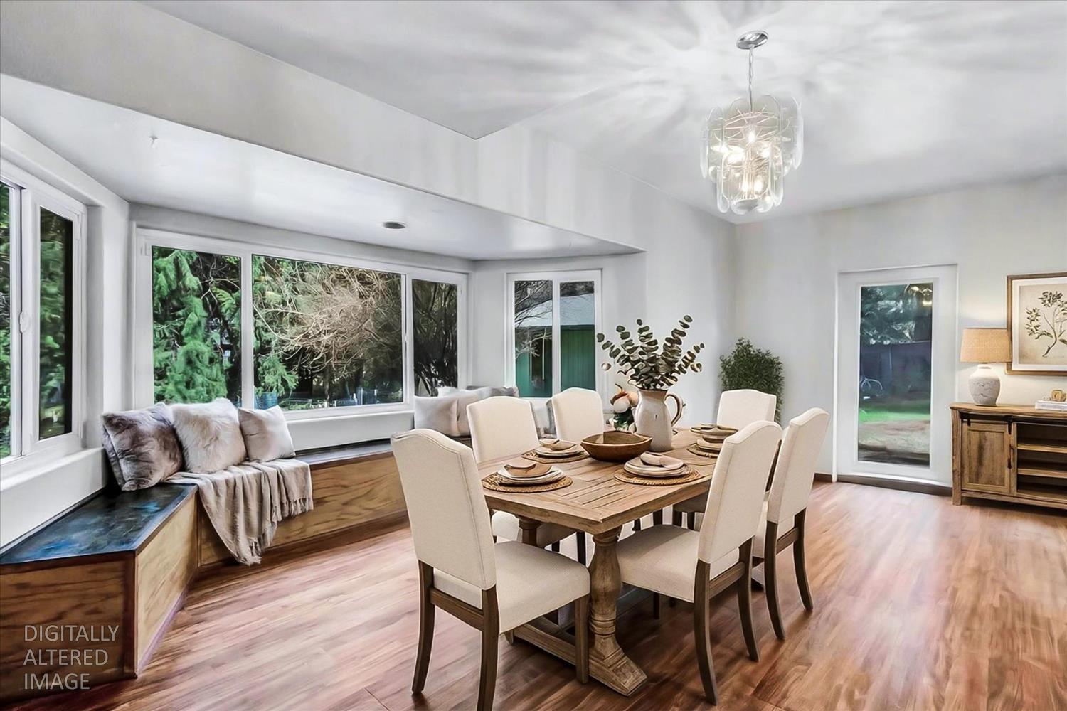 11312 Alpine Lane Grass Valley, CA 95945 - Photo 8 of 69 a view of a dining room with furniture window and wooden floor