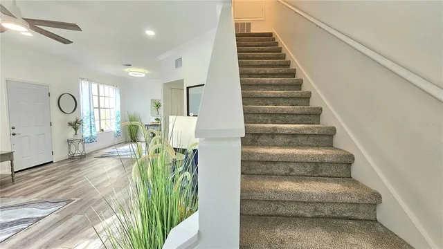 a bathroom with a sink toilet and a mirror