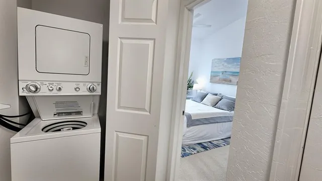 a view of a building with a bench in a yard