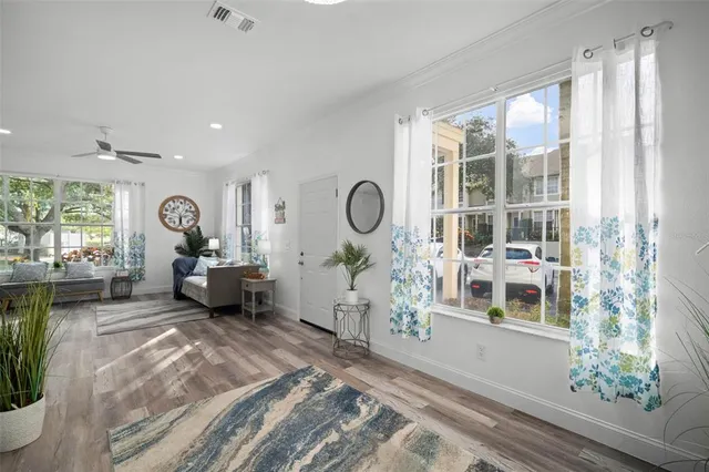 a view with a sink and potted plant