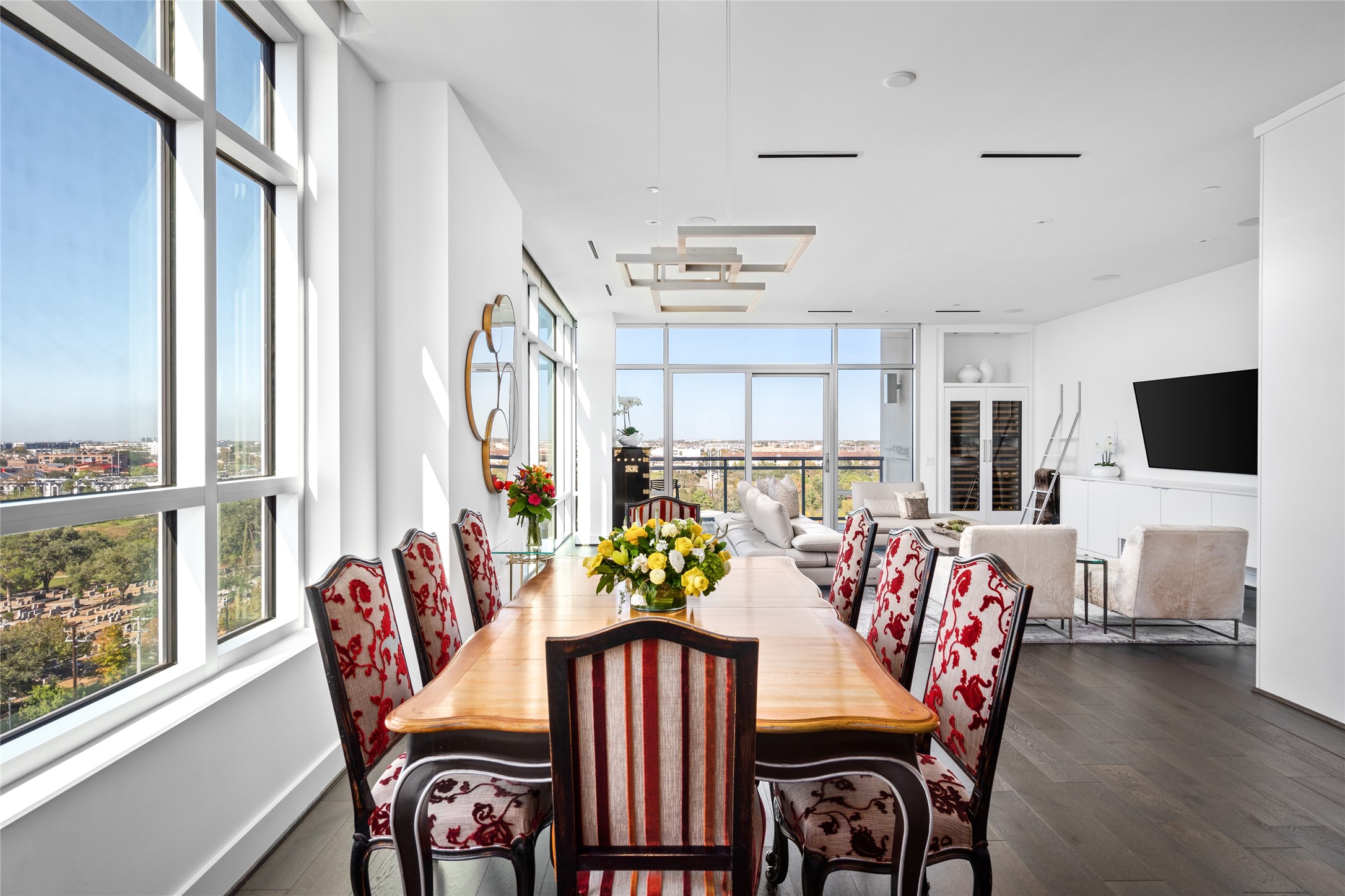 3331 D'Amico Street, Unit 904 Houston, TX 77019 - Photo 5 of 21 a view of a dining room with furniture window and wooden floor