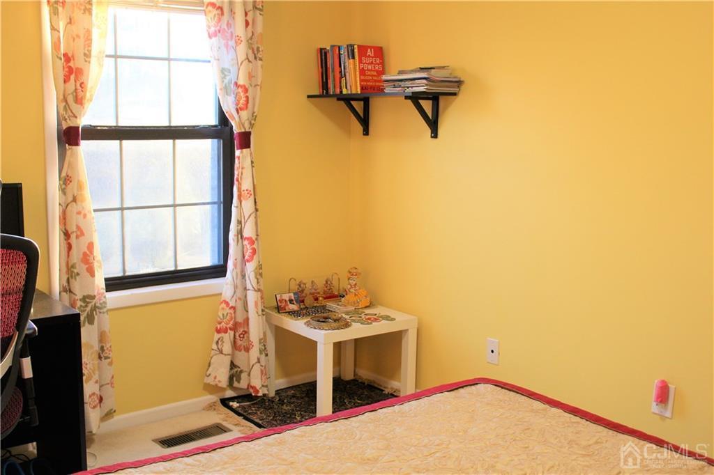 4602 Stonehedge Road, Unit 4602 Edison, NJ 08820 - Photo 12 of 25 a bathroom with a sink and a window