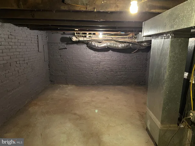 a view of a door of a house with wooden fence