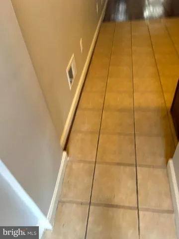 a bathroom with a sink a mirror and a shower