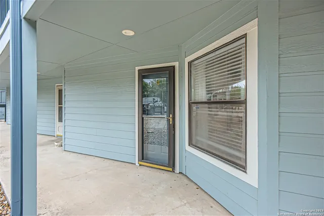 a view of a yard with a bench