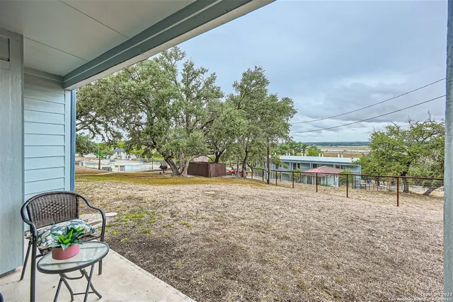 a view of a yard with an outdoor space