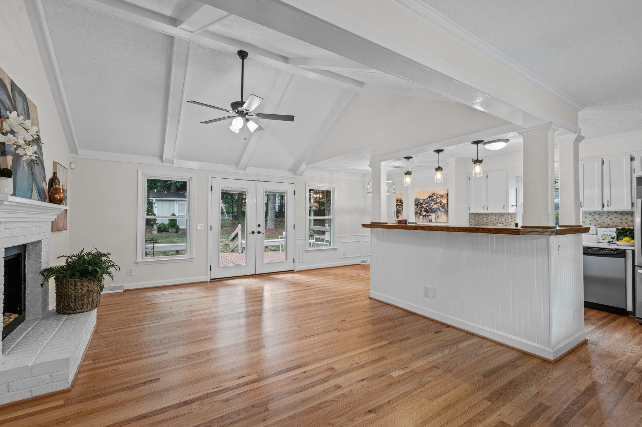 7321 Ridge Grove Court Raleigh, NC 27615 - Photo 31 of 33 Open Floor Plan with Family Room, Kitchen and Dining having French Doors and Plenty of Windows letting in the natural sunlight. Open Floor Plan