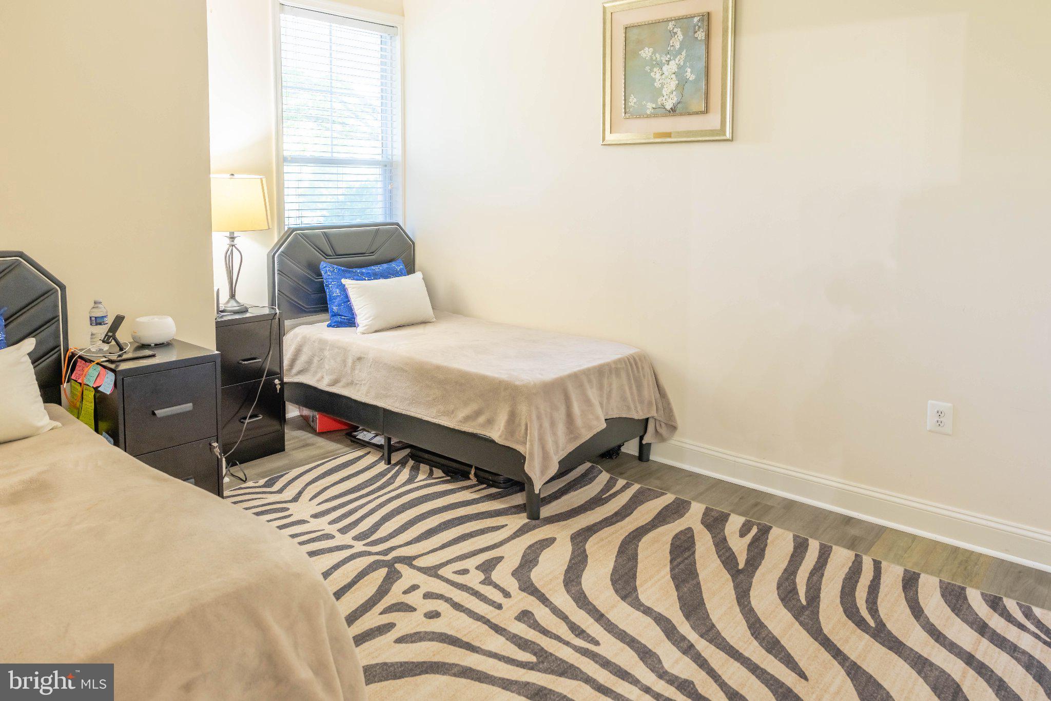 12824 Clarksburg Square Road, Unit 105 Clarksburg, MD 20871 - Photo 66 of 96 Serene bedroom with stylish accents.