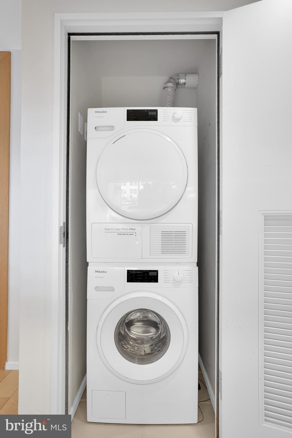 925 H Street Northwest, Unit 506 Washington, DC 20001 - Photo 22 of 36 a utility room with a washer and dryer