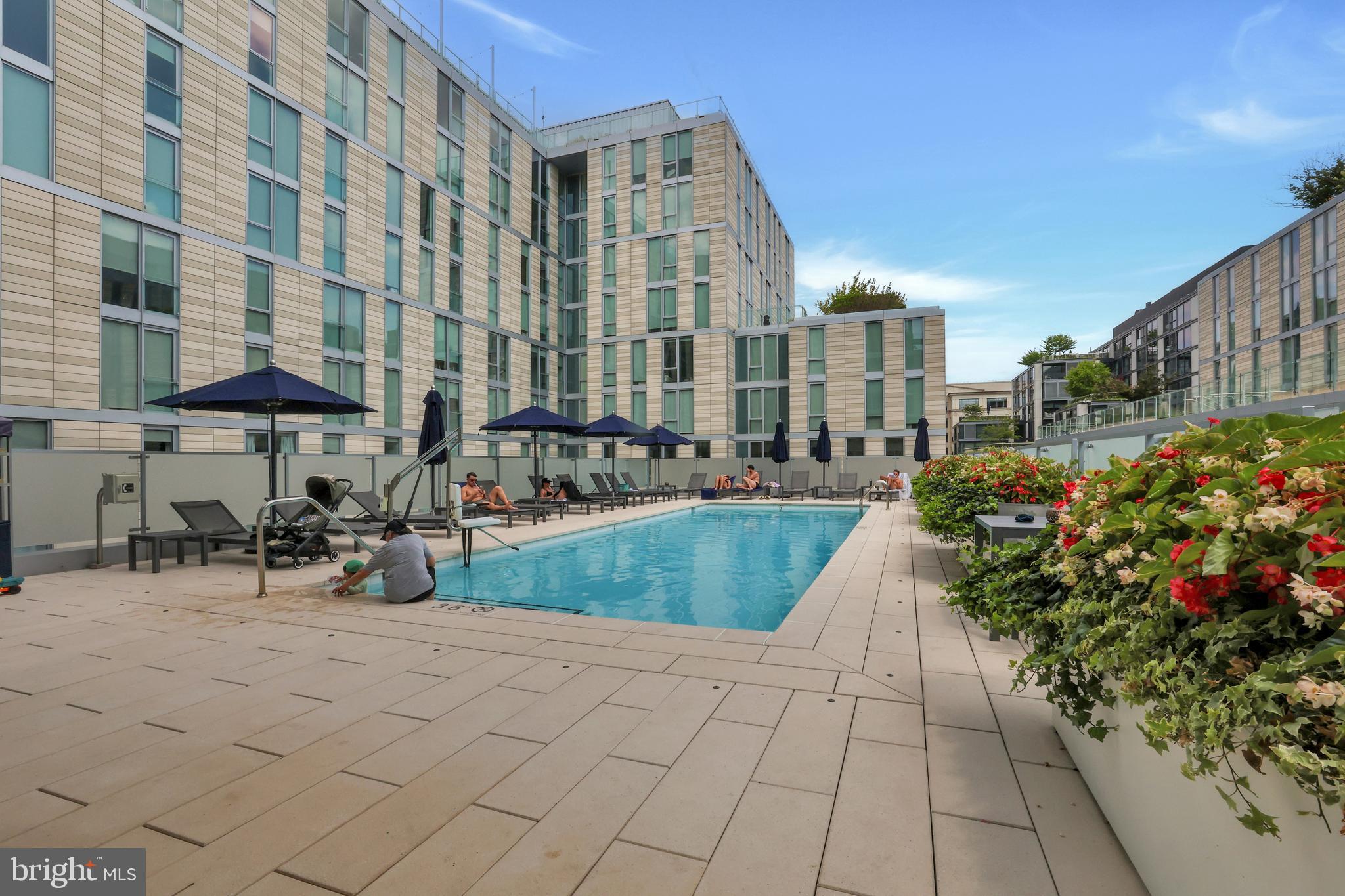 925 H Street Northwest, Unit 506 Washington, DC 20001 - Photo 25 of 36 a view of street with an outdoor seating