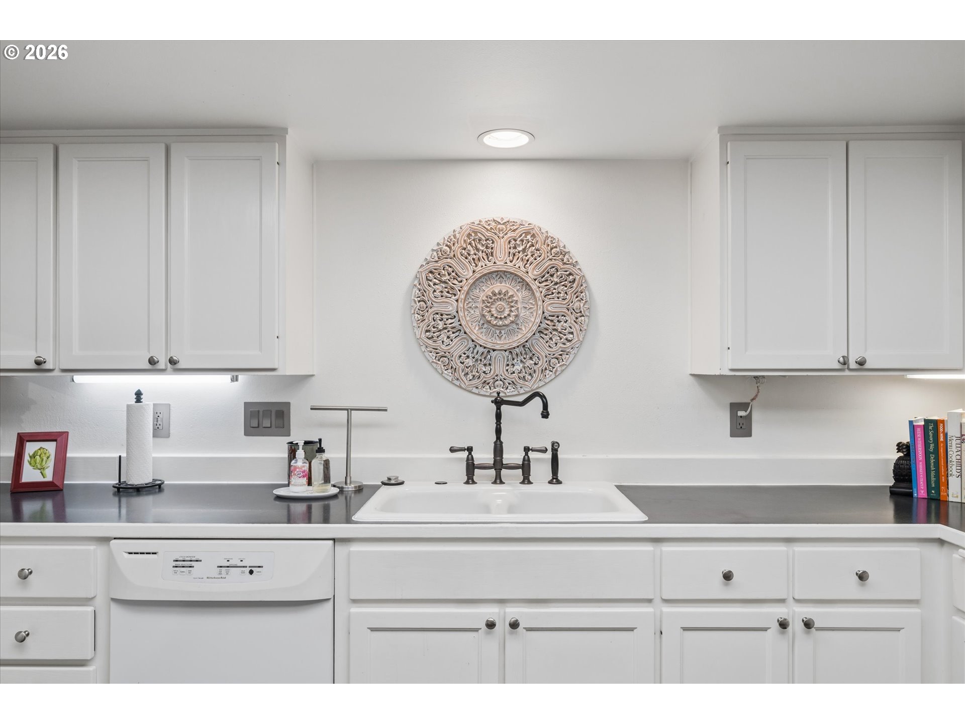 599 Wimbledon Court Eugene, OR 97401 - Photo 11 of 45 a kitchen with a sink and cabinets