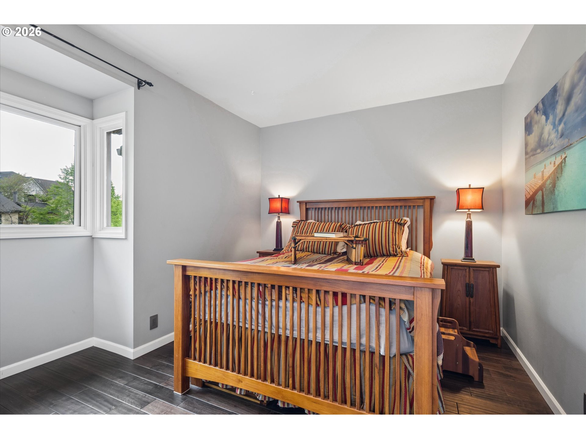 599 Wimbledon Court Eugene, OR 97401 - Photo 21 of 45 a bedroom with a bed and a window