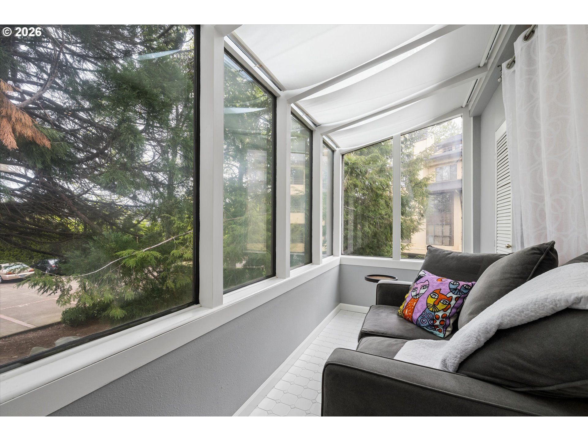 599 Wimbledon Court Eugene, OR 97401 - Photo 28 of 45 a living room with furniture and floor to ceiling windows