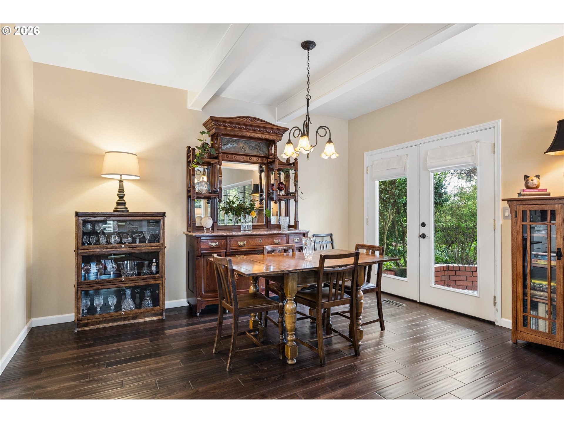 599 Wimbledon Court Eugene, OR 97401 - Photo 6 of 45 a view of a dining room with furniture window and wooden floor
