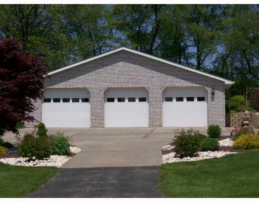 239 Winfield Road Sarver, PA 16055 - Photo 7 of 8 Parking Lot/Garage. Garage space for six vehicles. Bring all of your toys!