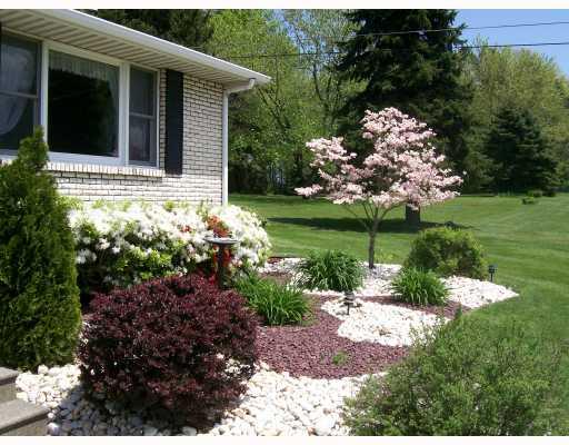 239 Winfield Road Sarver, PA 16055 - Photo 8 of 8 Yard/Garden. Lush landscaping