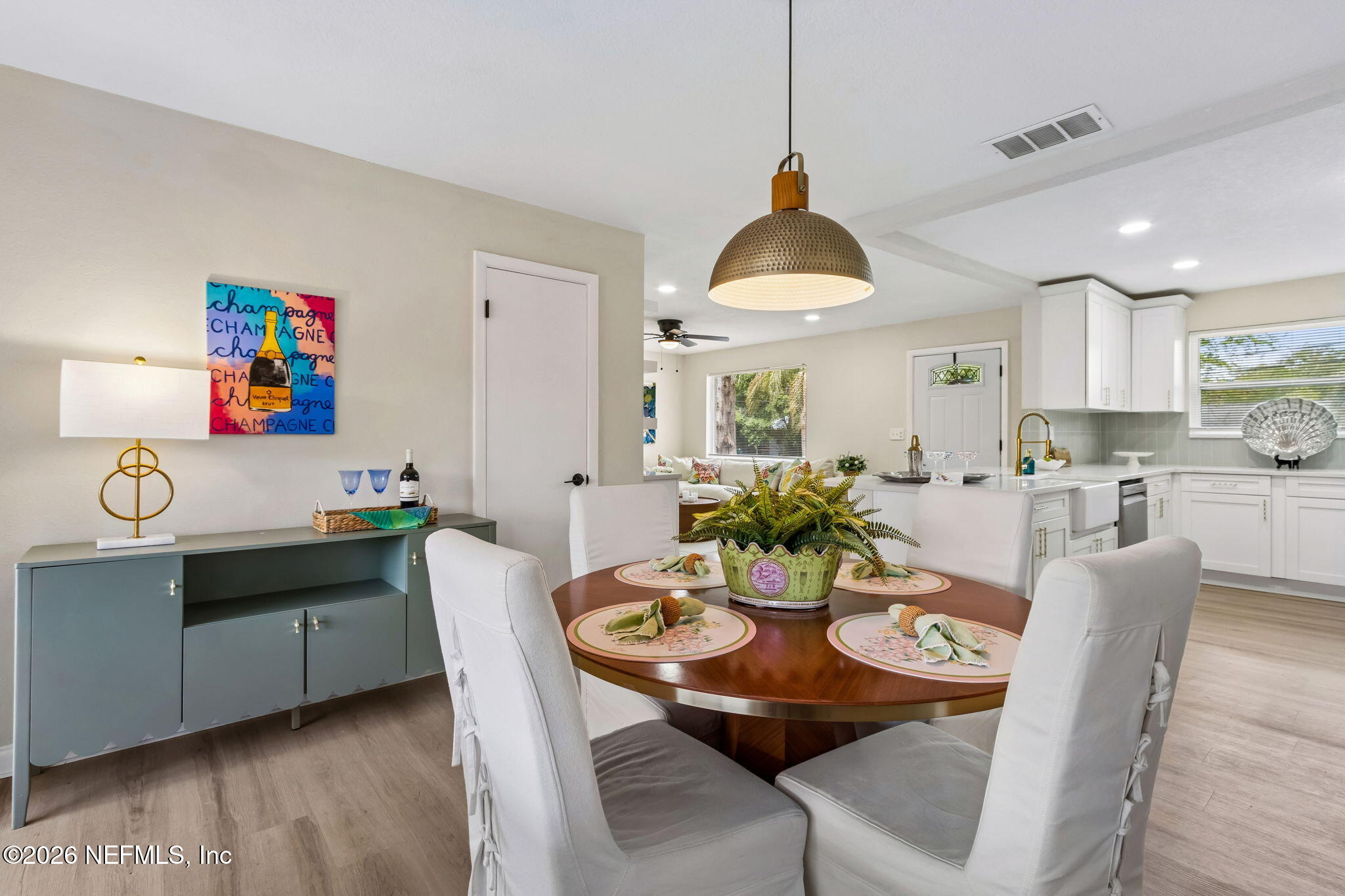3668 Marianna Road Jacksonville, FL 32217 - Photo 13 of 27 a view of a dining room with furniture window and wooden floor