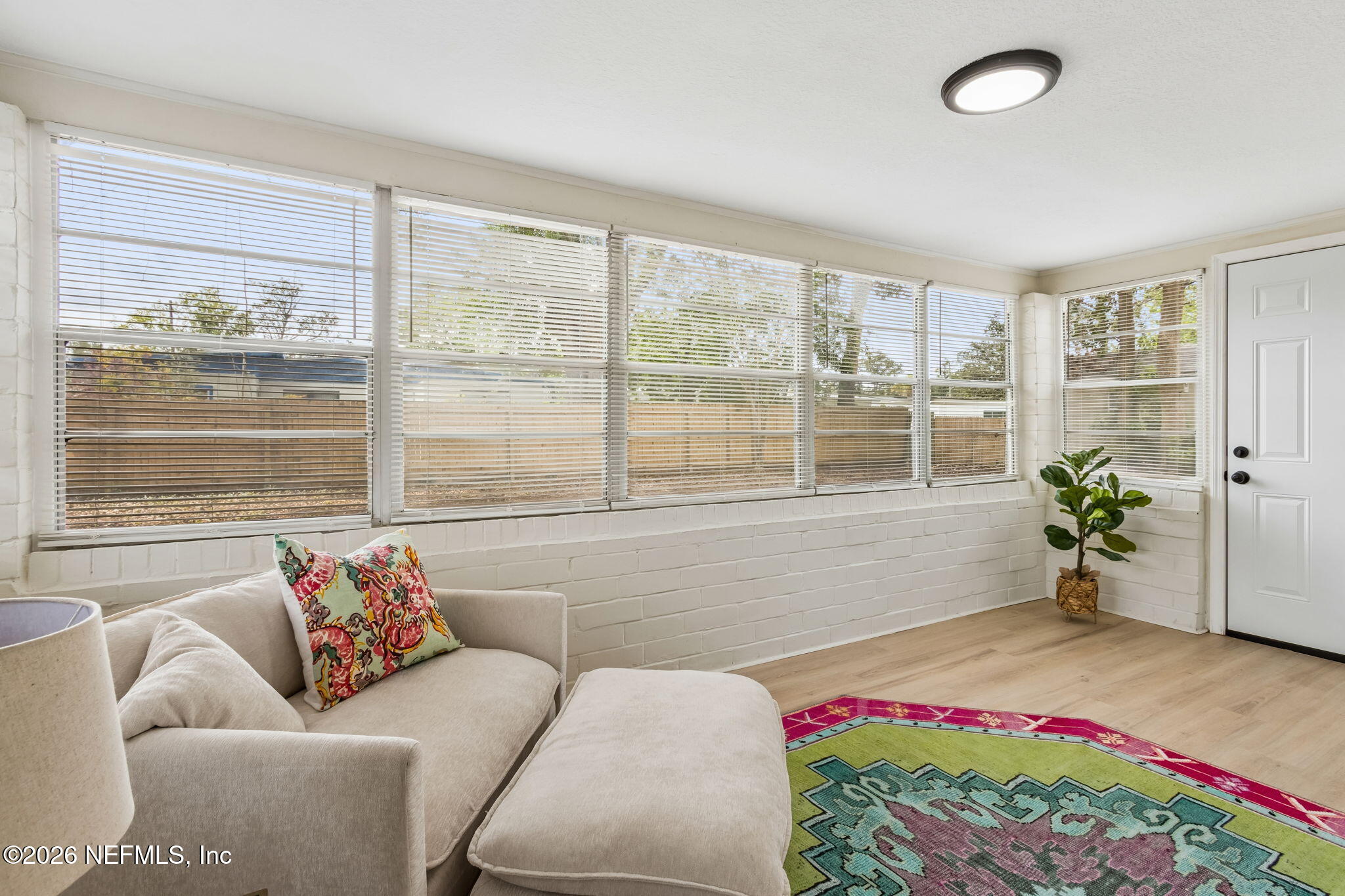 3668 Marianna Road Jacksonville, FL 32217 - Photo 15 of 27 a living room with furniture and a large window