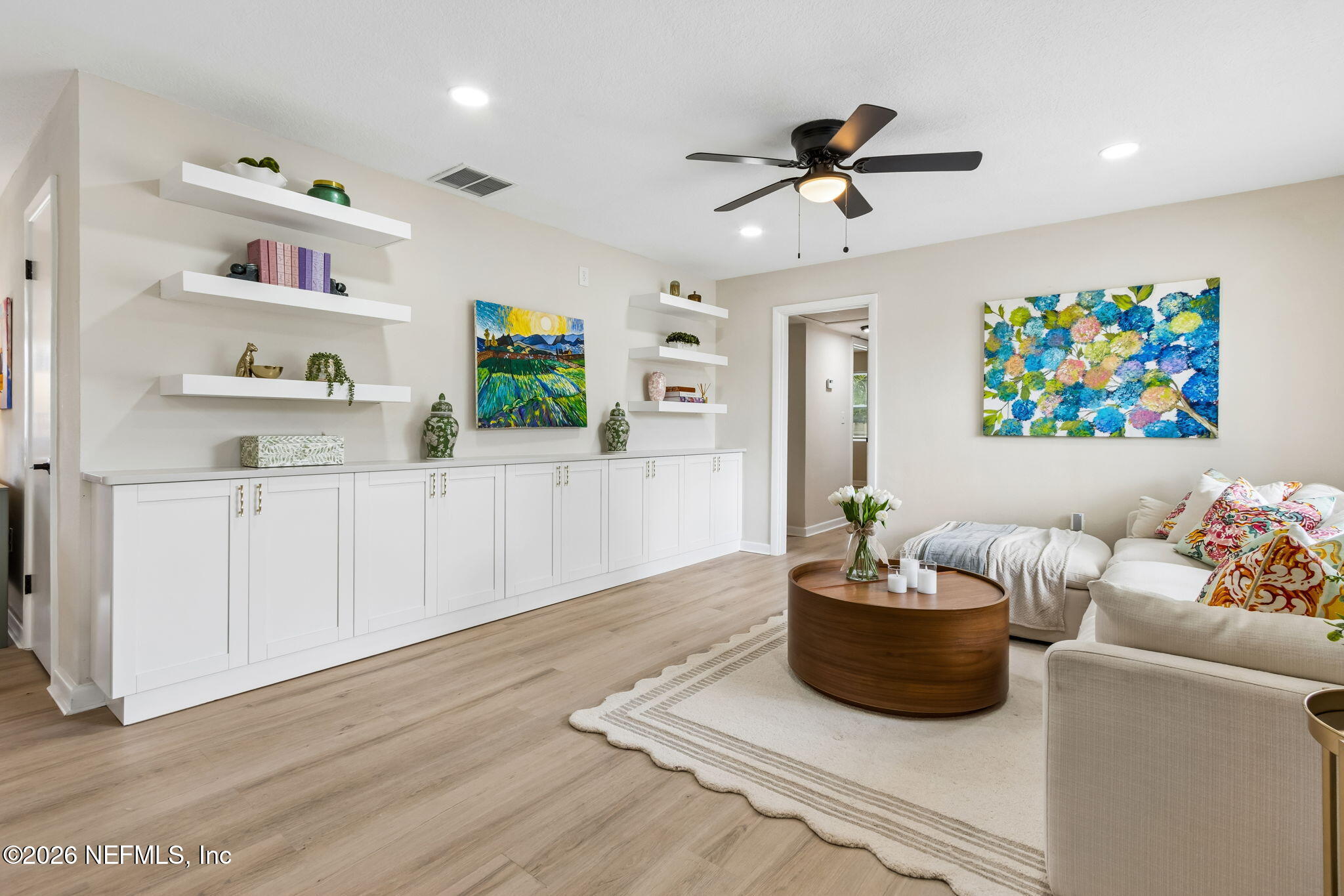 3668 Marianna Road Jacksonville, FL 32217 - Photo 3 of 27 a living room with furniture and a potted plant