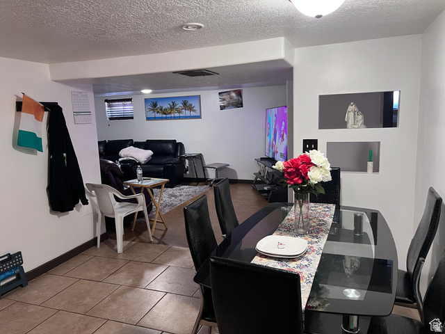 174 North 500 East Logan, UT 84321 - Photo 9 of 32 Basement Dining