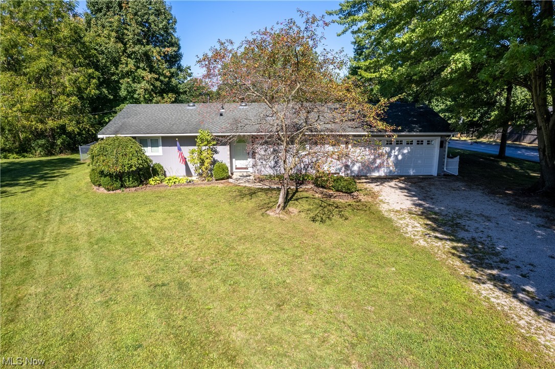 44790 Middle Ridge Road Amherst, OH 44001 - Photo 1 of 23 Ranch-style house featuring garage and a front lawn