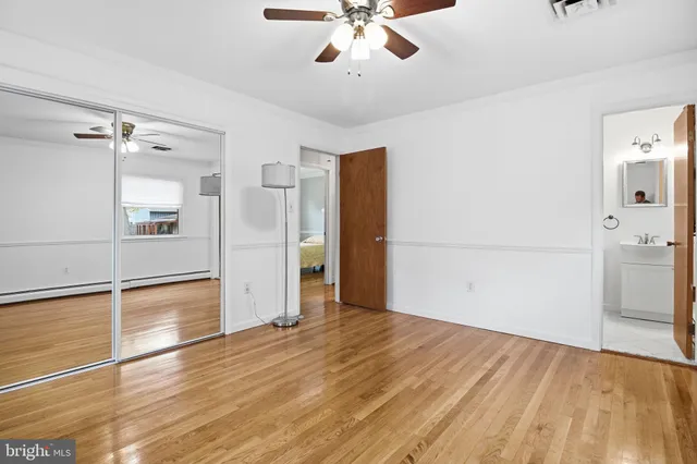 a view of a livingroom with wooden floor